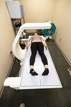 Person laying on an imaging table